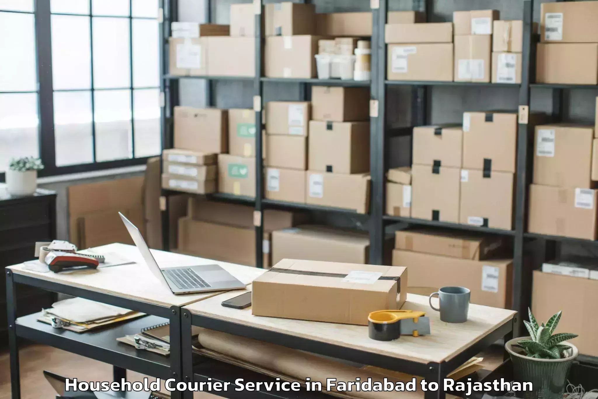 Get Faridabad to Sunrise University Alwar Household Courier